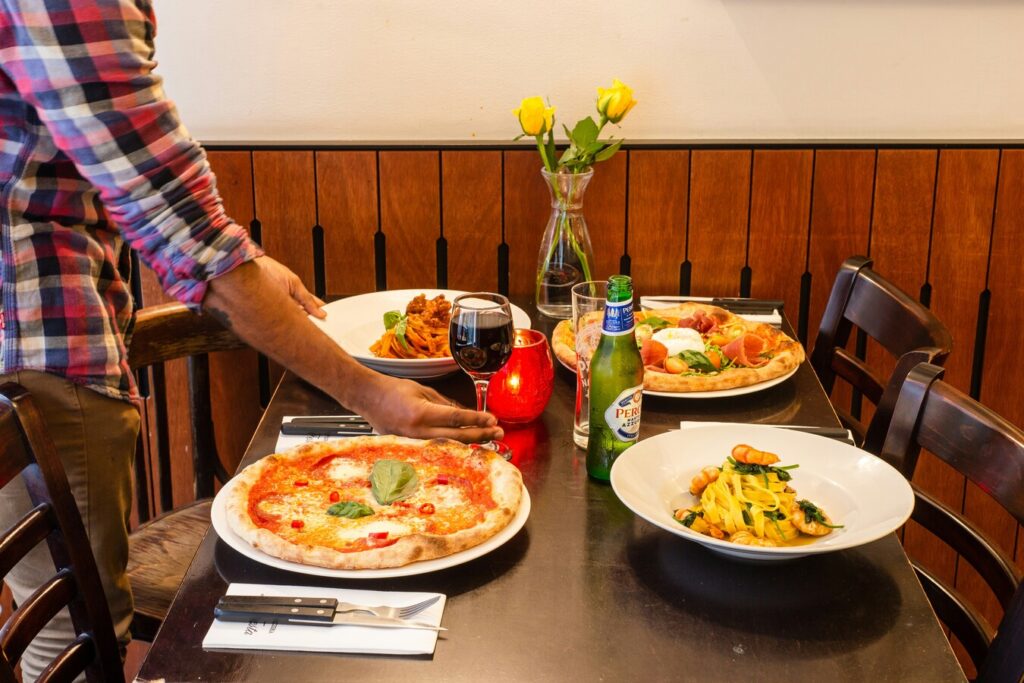 thin pizza on wooden table
